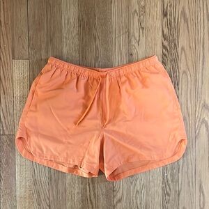 ASOS DESIGN swim shorts in orange